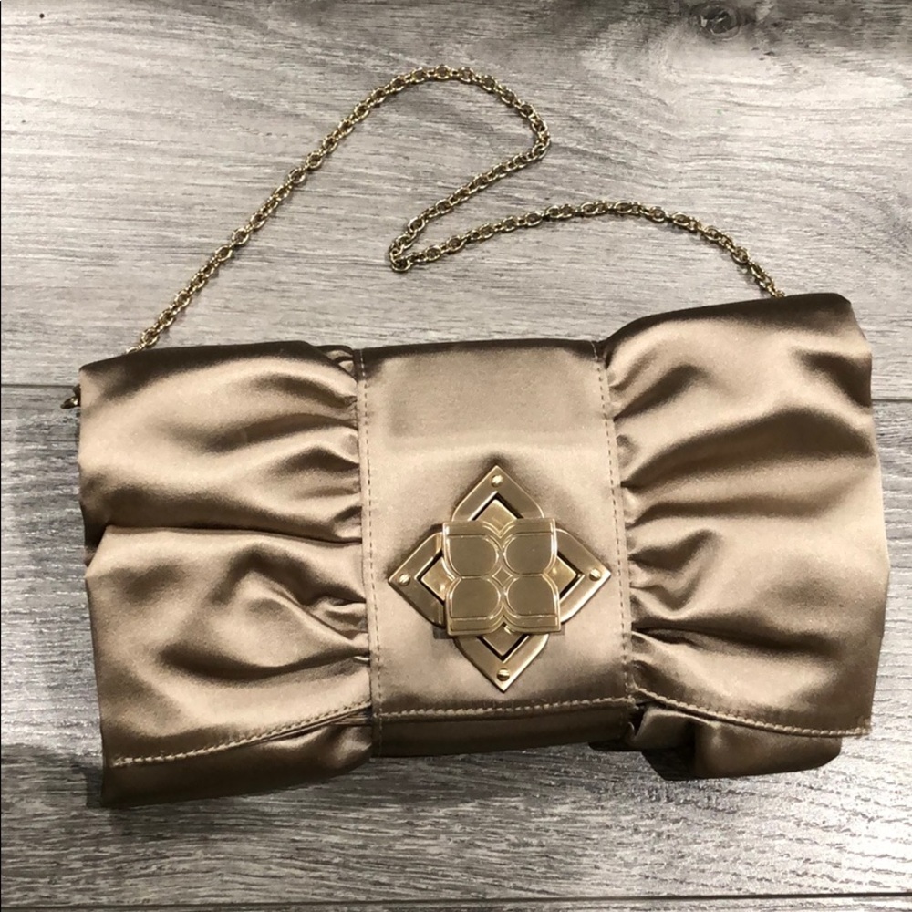 BCBG Maxazria Clutch in Gold!! New!!